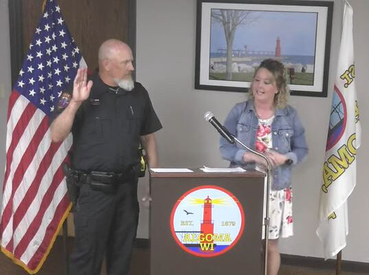 Swearing in of a new police chief.