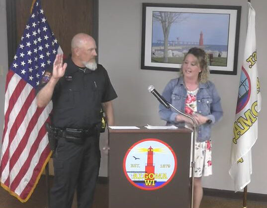 Swearing in of a new police chief.