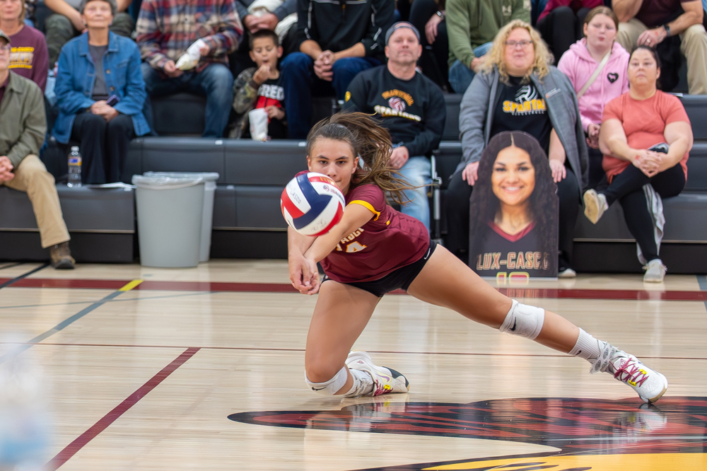 L-C's Isabella Vander Velden gets to the ball to record a dig against Winneconne in Round 1 of the playoffs at home on Thursday, Oct. 19. Josh Staloch photo