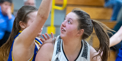 Algoma forward Therese Gerdman, a sophomore, eyes up a shot in the paint