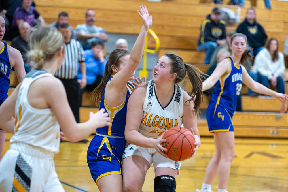 Algoma forward Therese Gerdman, a sophomore, eyes up a shot in the paint 
