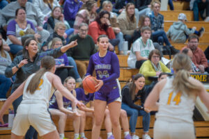 Kewaunee's Jade Kroll looks for an open teammate as the Storm's offense comes together against Algoma last Thursday
